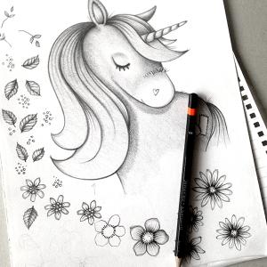 Another busy day sketching River the Unicorn for the upcoming card range...
